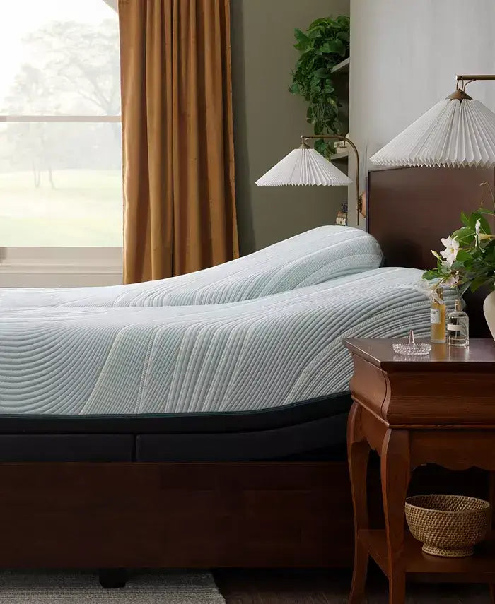 Tempur-Pedic TEMPUR-ProAdapt Firm 12" Mattress on an adjustable base in a stylish bedroom setting.