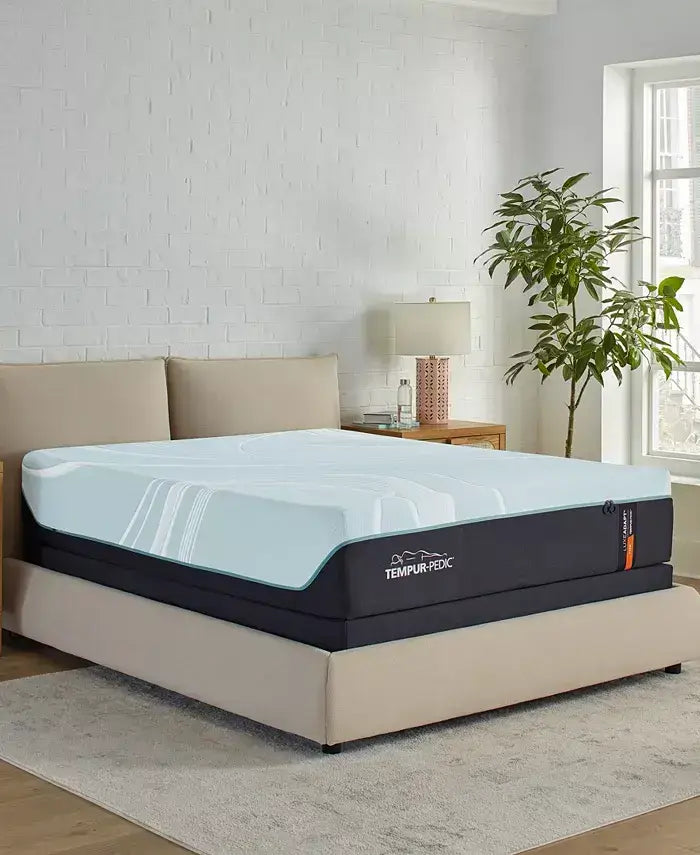 Tempur-Pedic TEMPUR-LuxeAdapt® 13" Firm Mattress on a stylish bed in a bright modern bedroom setting.