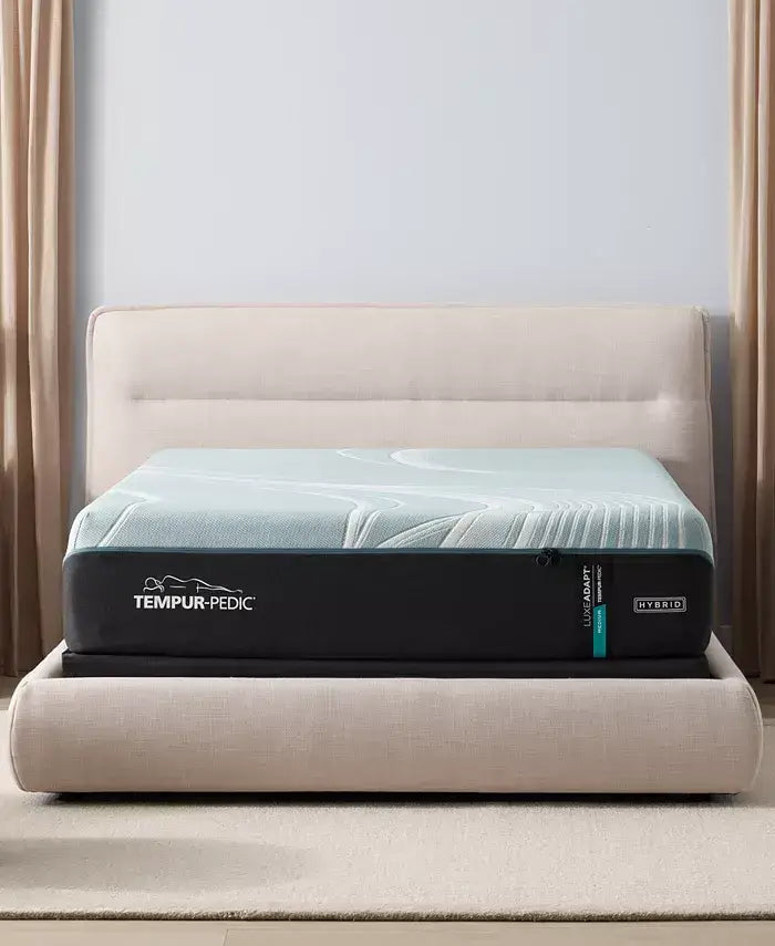 Tempur-Pedic TEMPUR-LuxeAdapt 13" Medium Hybrid Mattress on a stylish bed, showcasing innovative sleep technology.