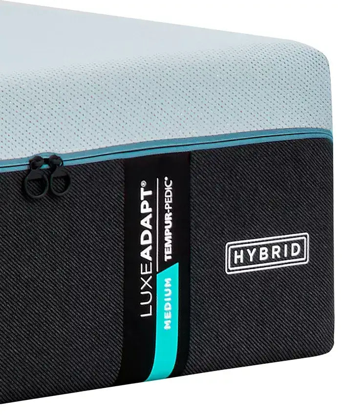 Tempur-Pedic LuxeAdapt 13" Medium Hybrid Mattress corner view showcasing label and zipper details.