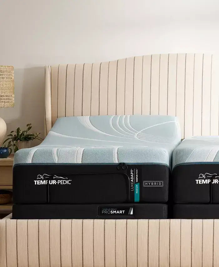 Tempur-Pedic LuxeAdapt 13" Medium Hybrid mattress on a stylish bed frame for optimal comfort and sleep quality.