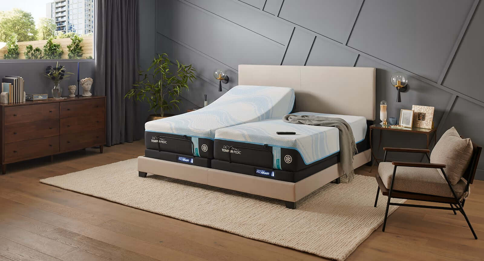 Tempur-Pedic TEMPUR-Ergo® ProSmart Adjustable Base in a modern bedroom setting with cozy decor.
