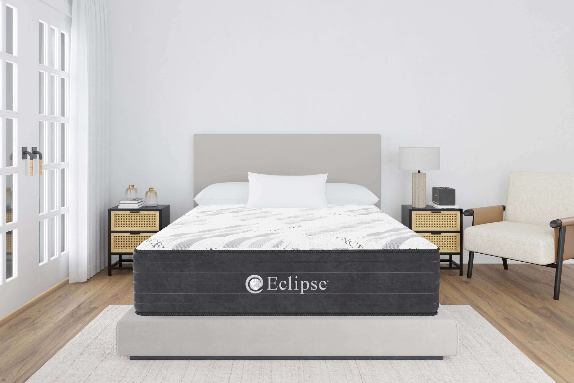 Eclipse Cares Collection Joyfulness Hybrid 11" plush mattress in a modern bedroom setting with stylish furniture.
