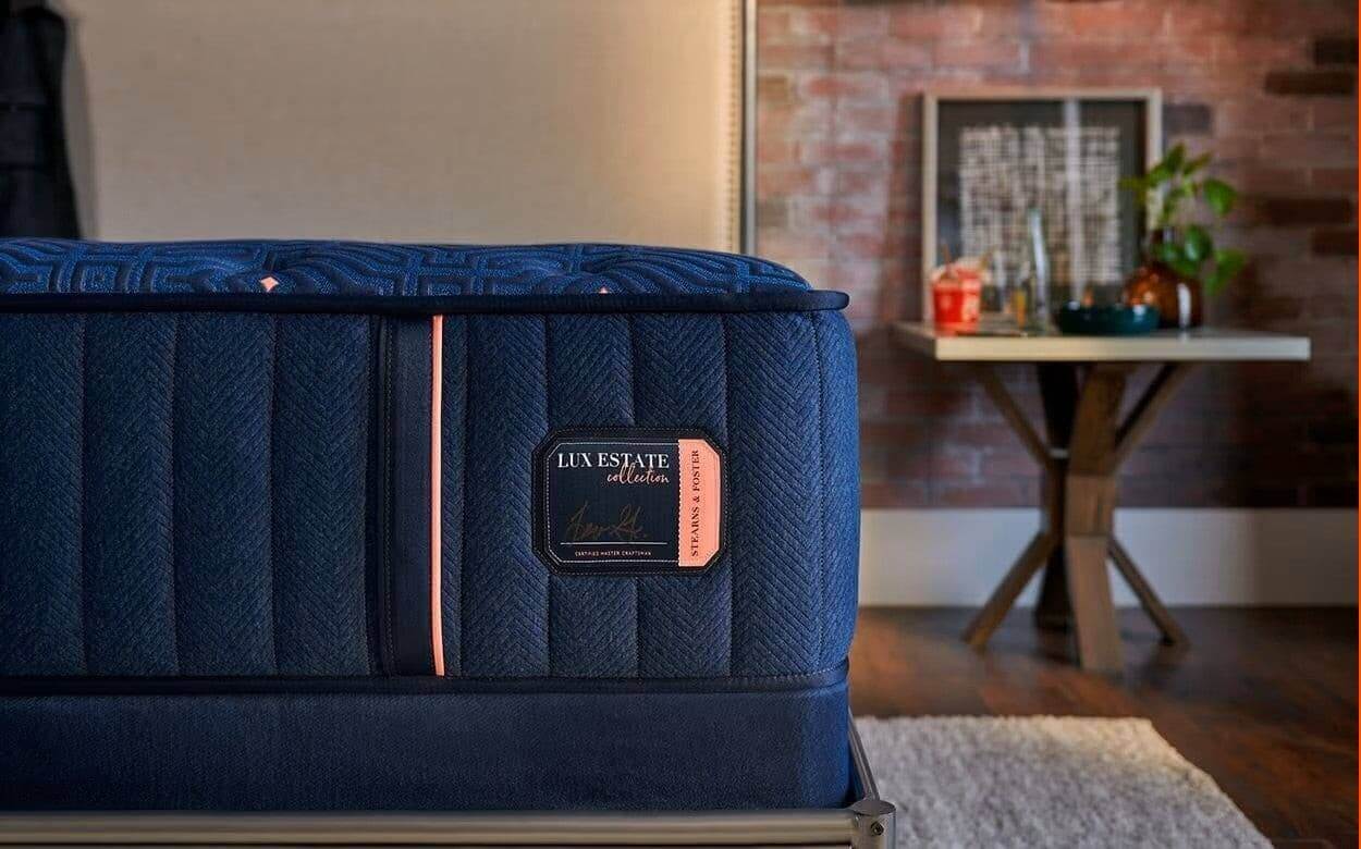 Stearns & Foster Lux Estate® Ultra Firm 14.5" mattress detail showcasing luxurious craftsmanship and design in a bedroom setting.