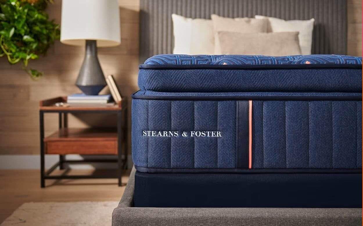 Stearns & Foster Lux Estate Firm Pillow Top Mattress showcasing plush comfort and quality craftsmanship in a stylish bedroom setting.