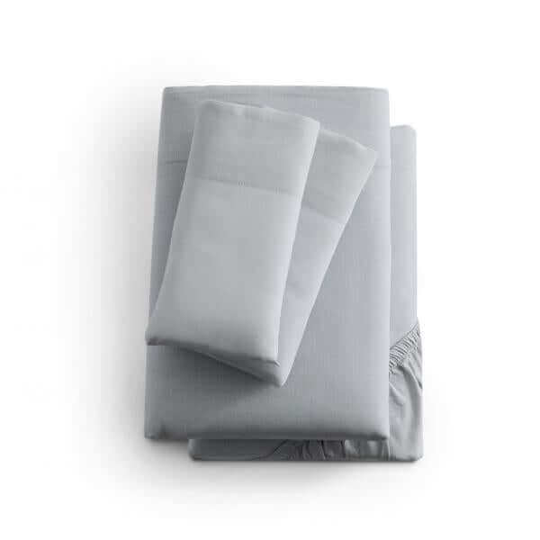 Malouf Fog Linen Weave Cotton Sheet Set in soft gray, featuring fitted sheet, flat sheet, and pillowcases. Lightweight and breathable design.