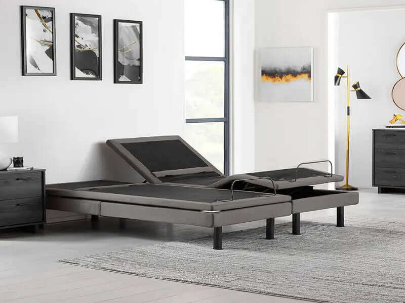 Malouf S-755 charcoal gray adjustable base in modern bedroom setting with stylish decor and furnishings.