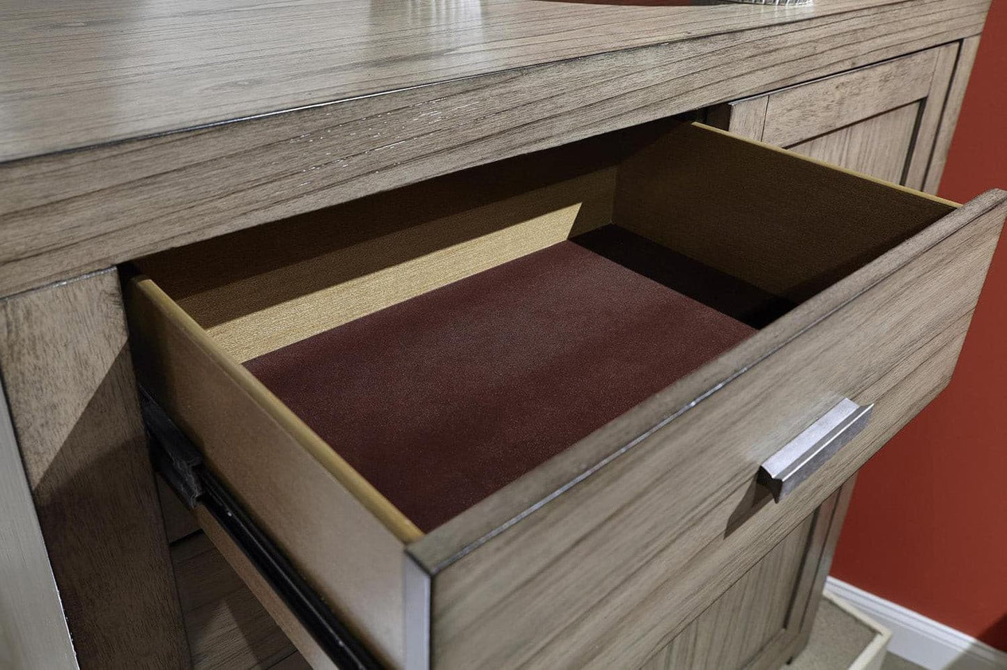 Open drawer of Modern Loft Graystone Sliding Door Chest showcasing quality craftsmanship and dovetail joinery.