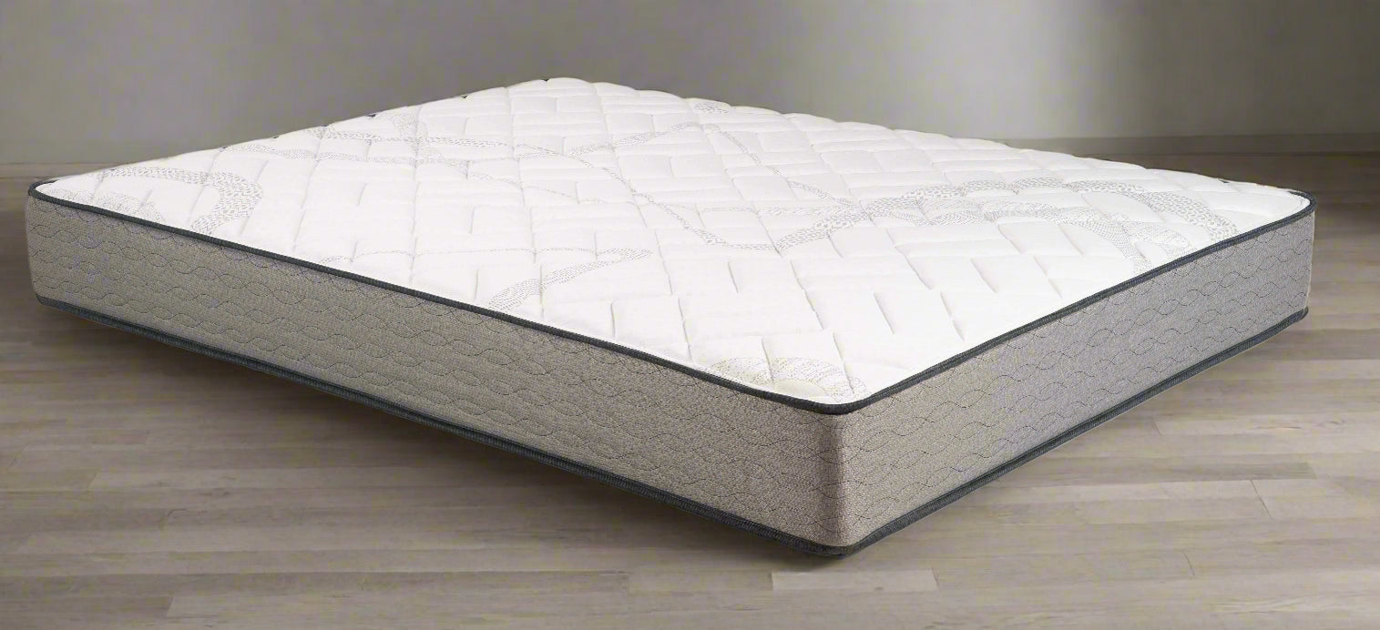 Spring Air Dogwood Firm 8" mattress featuring a comfortable quilted surface and sturdy continuous coil support system.