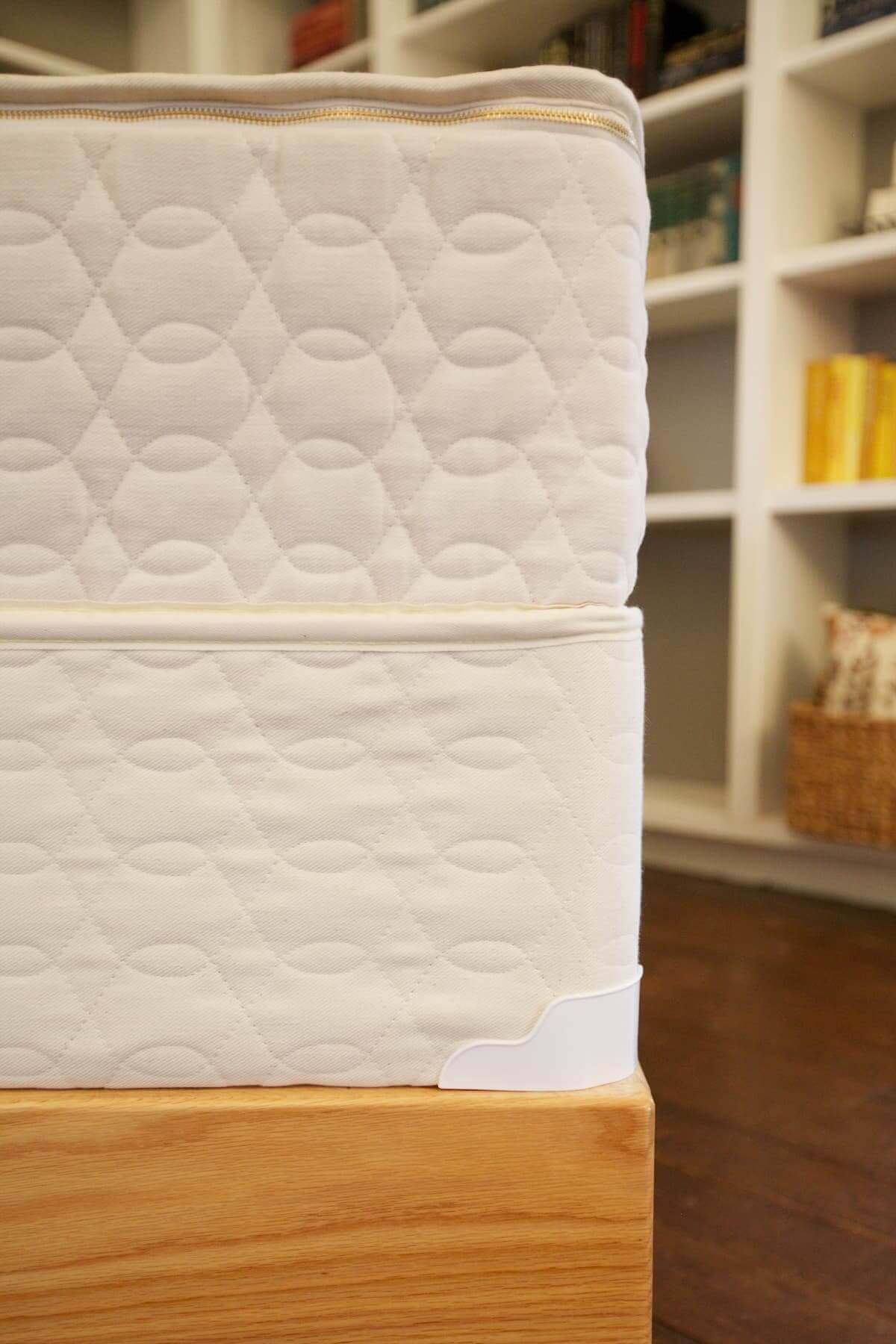 Savvy Rest Standard Profile 9" Mattress Foundation with a latex mattress atop a natural wooden base.