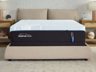 TEMPUR-Pedic TEMPUR-LuxeAdapt® Soft 13" Mattress on a stylish bed frame, showcasing comfort and innovative design.