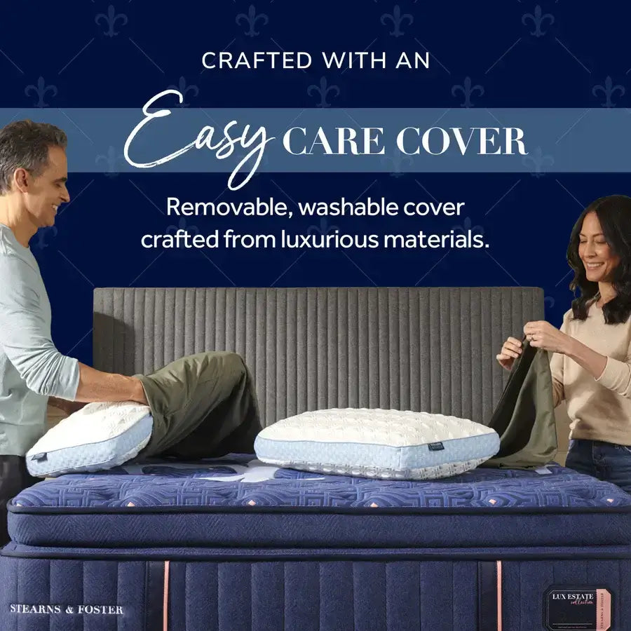 Couple demonstrating the removable, washable easy care cover on a luxury Stearns & Foster mattress.