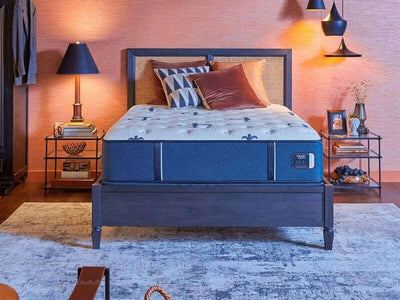 Stearns & Foster Studio Medium 14" mattress displayed in a stylish bedroom setting with modern decor.
