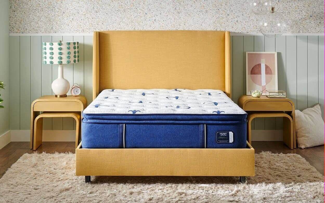 Stearns & Foster Studio Medium Euro Pillow Top mattress showcased on a stylish bed frame in a contemporary bedroom setting.