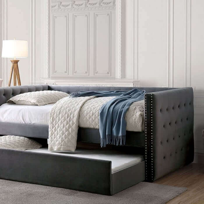 Susanna Gray Daybed with button tufting, nailhead trim, and pull-out trundle for extra bedding.