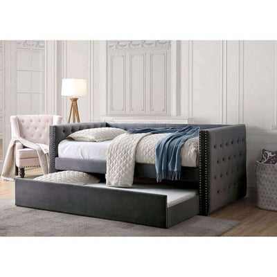 Susanna Gray Daybed with button tufting and pull-out trundle, perfect for stylish comfort and extra bedding.