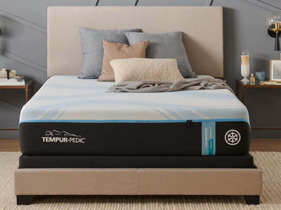 Tempur-Pedic TEMPUR-ProBreeze 12" mattress on a stylish bed with pillows and decorative throw.
