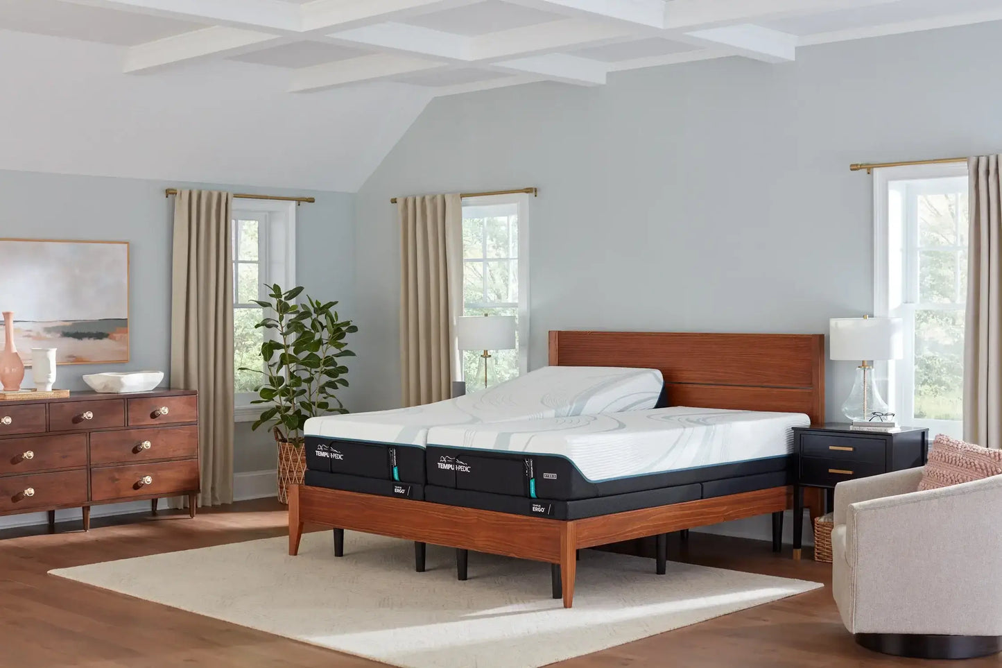 Modern bedroom featuring a Tempur-Pedic TEMPUR-Adapt® 11" Medium Mattress on a stylish wooden bed frame.
