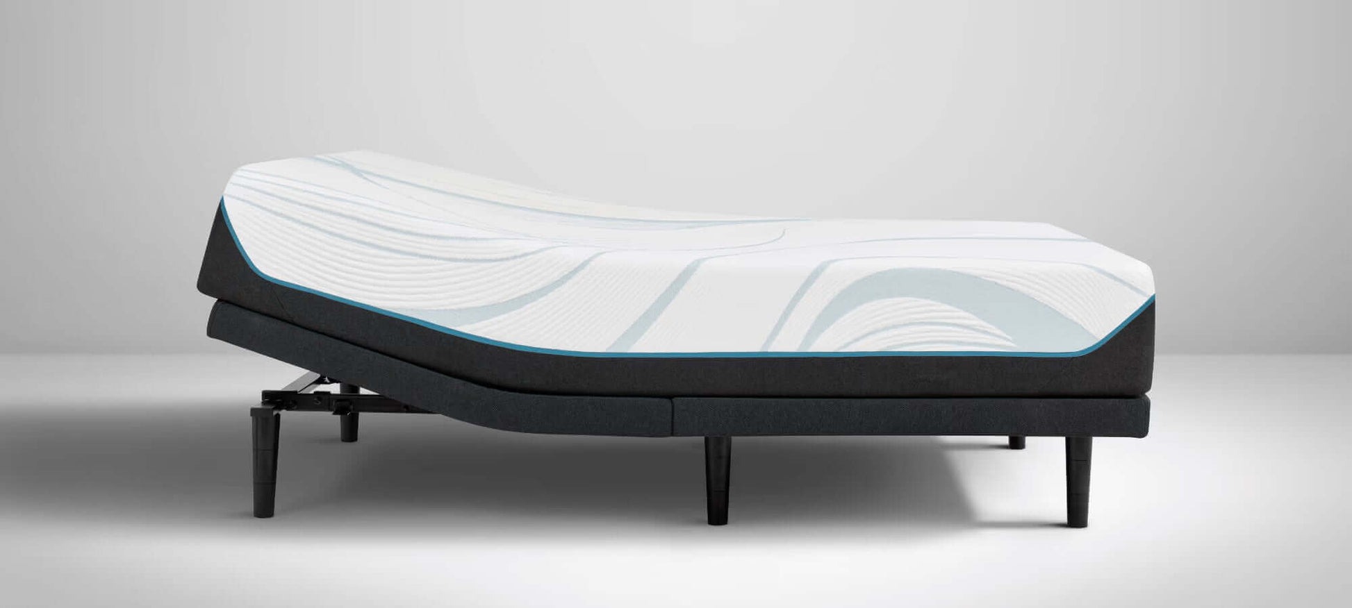 Tempur-Pedic TEMPUR-Adapt 11" Medium Mattress on an adjustable base showcasing its elegant design and support features.