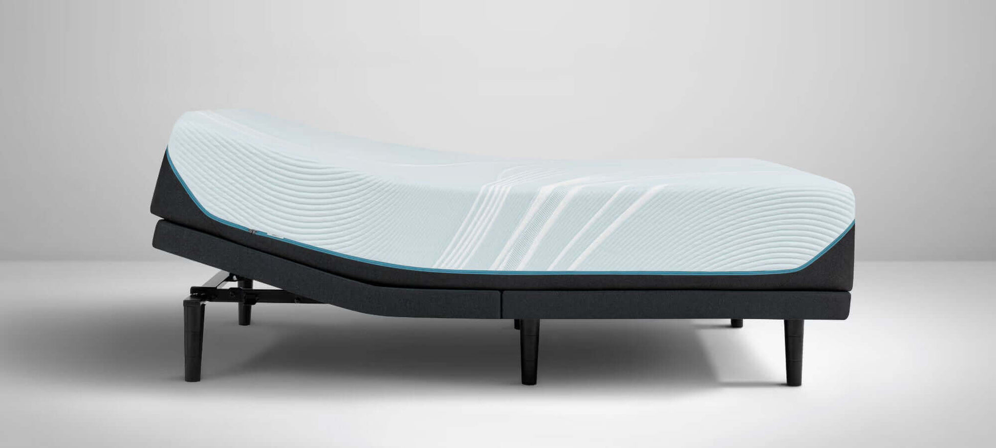 Tempur-Pedic TEMPUR-ProAdapt Firm 12" Mattress displayed on an adjustable base, showcasing its innovative design.