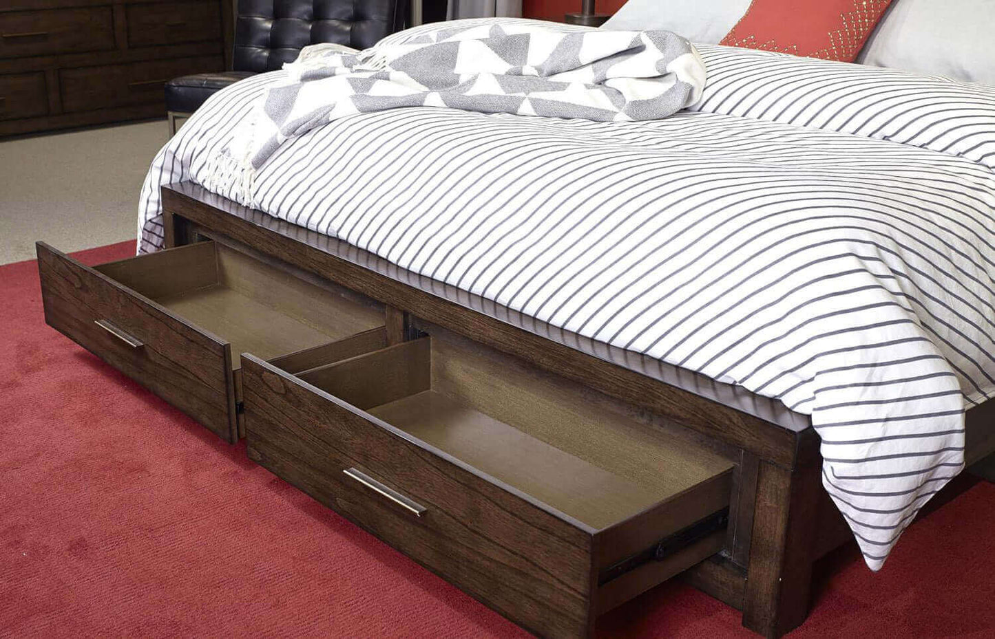 Modern Loft Brownstone Storage Panel Bed featuring open drawers and a cozy striped bedding set.