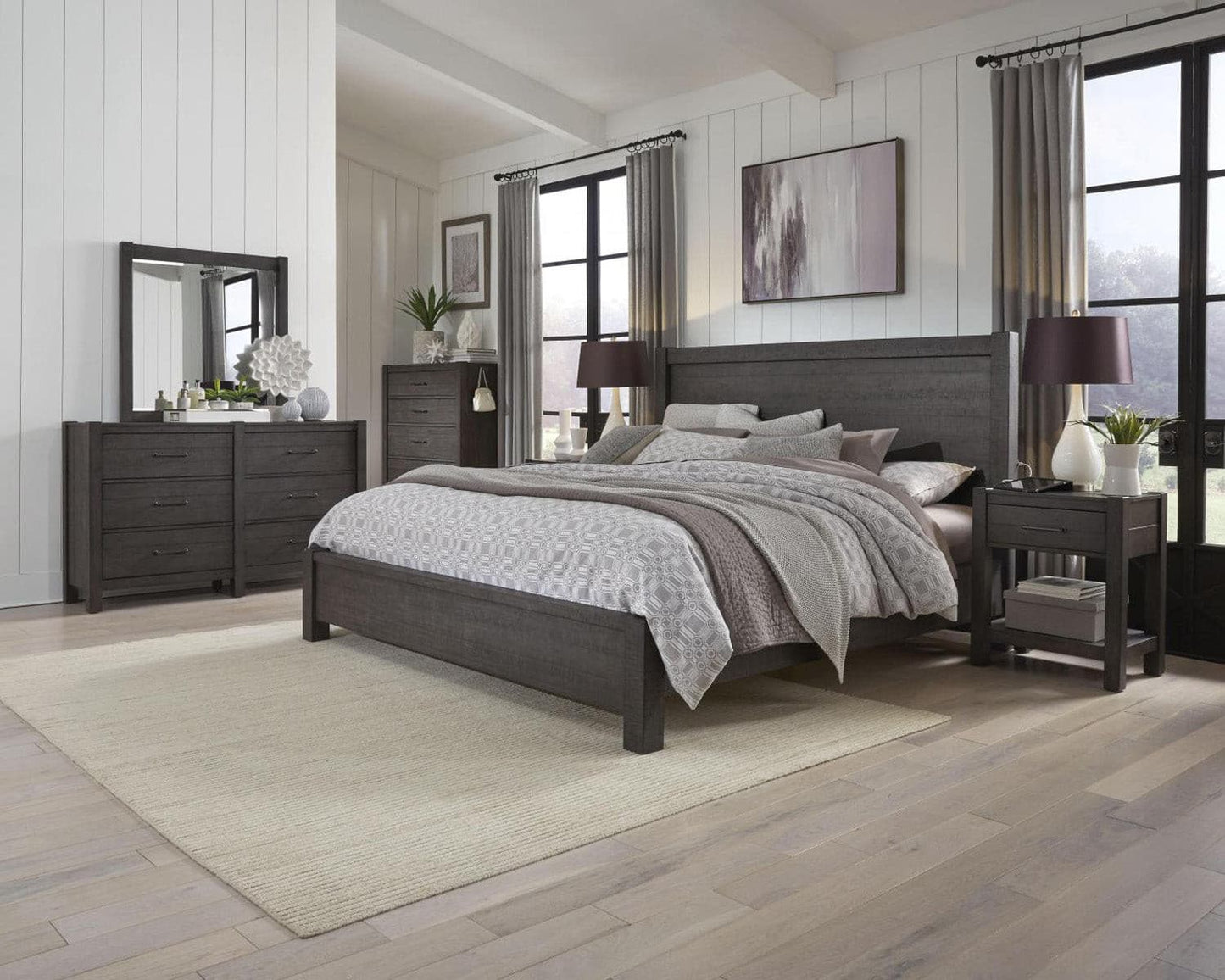 Modern bedroom setup featuring Mill Creek Collection furniture with neutral colors and natural light.