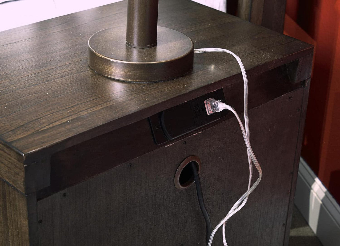 Modern Loft brownstone nightstand featuring angled AC outlets for easy device charging and a stylish design.