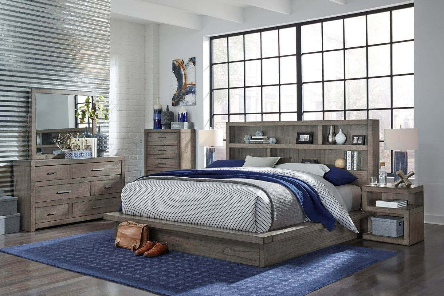 Modern loft bedroom featuring graystone nightstand, stylish bed, and storage drawers in a contemporary setting.