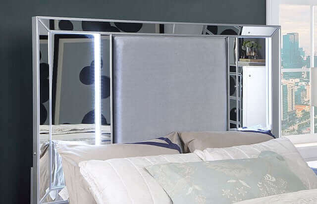 Belladonna Glam LED Storage Bed headboard featuring mirrored panels and ambient LED lighting for a luxurious look.