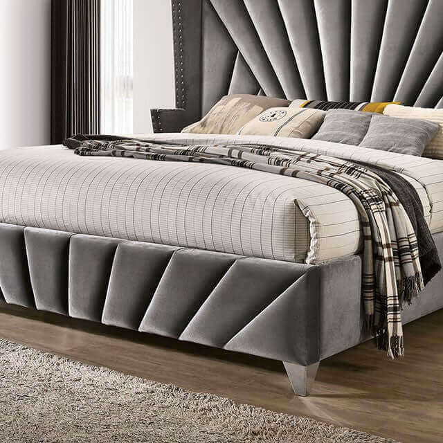 Carissa Gray Velvet Art Deco Bed with quilted upholstery and stylish pillows, showcasing vintage glamour in a modern bedroom setting.