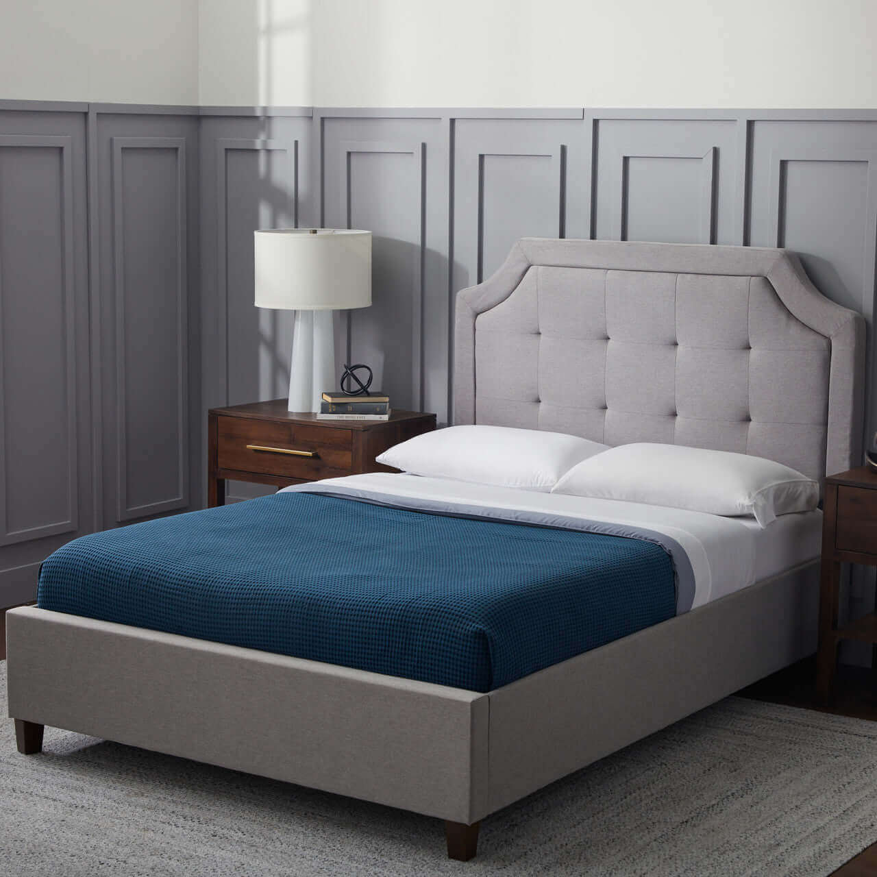 Malouf Carlisle Stone Gray Headboard in a stylish bedroom setup with plush upholstery and modern design.