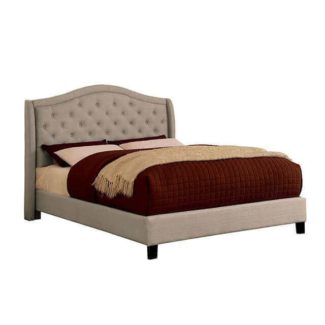 Carly gray tufted platform bed with button headboard and cozy brown bedding for a contemporary bedroom aesthetic.