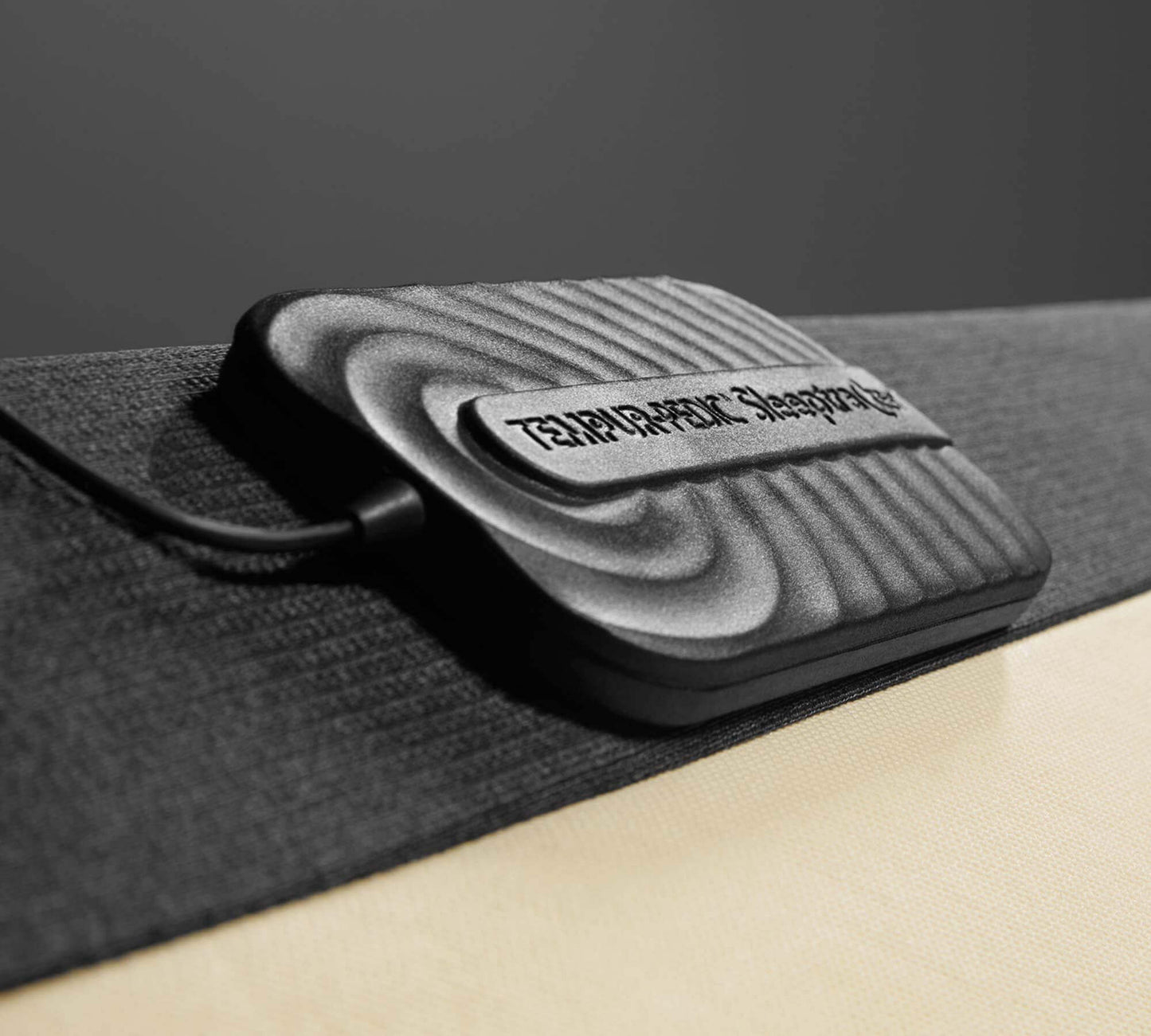 TEMPUR-Extend Smart Base SleepTracker AI device showcasing ergonomic design for enhanced sleep experience.