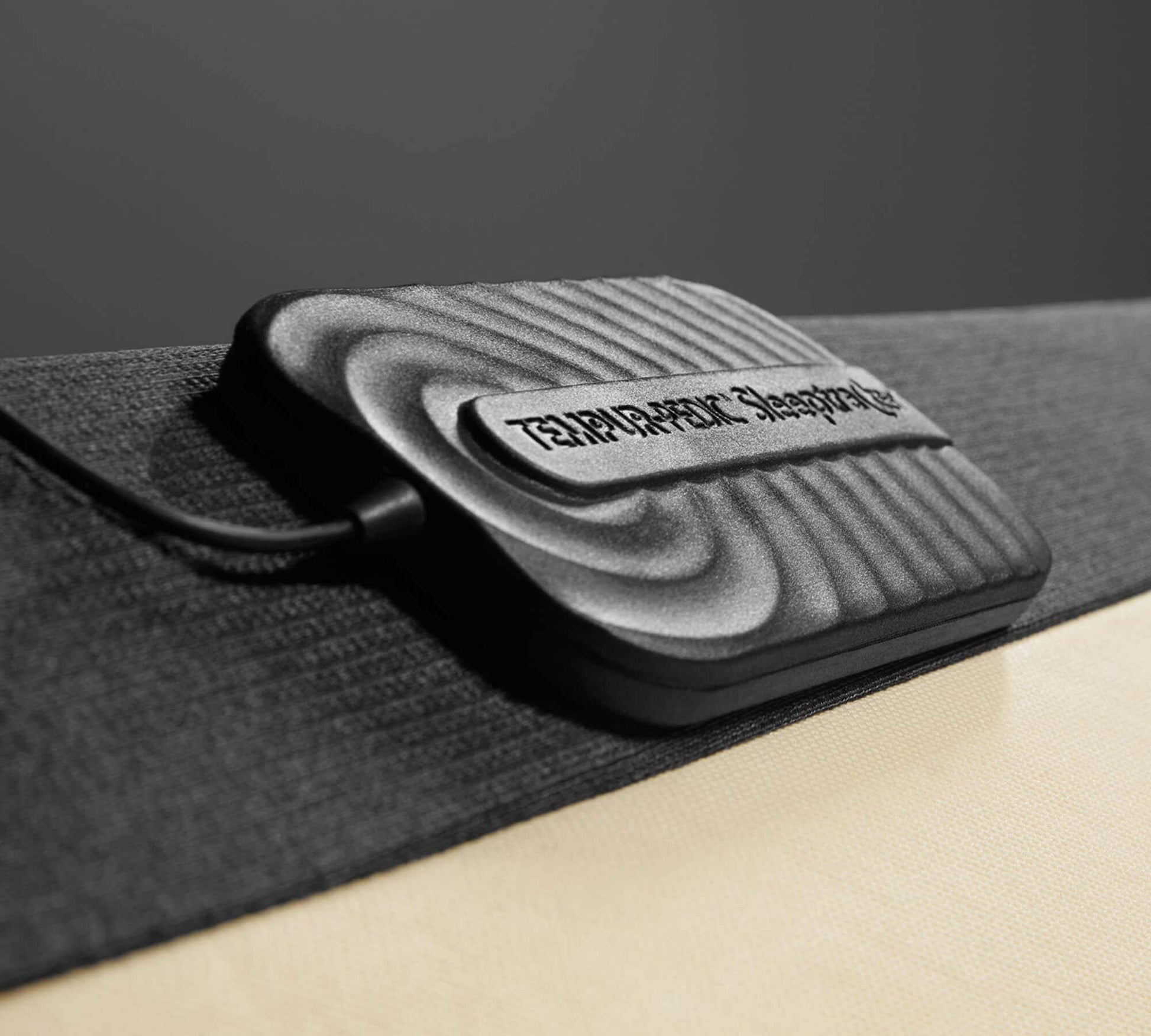 TEMPUR-Extend Smart Base SleepTracker AI device showcasing ergonomic design for enhanced sleep experience.