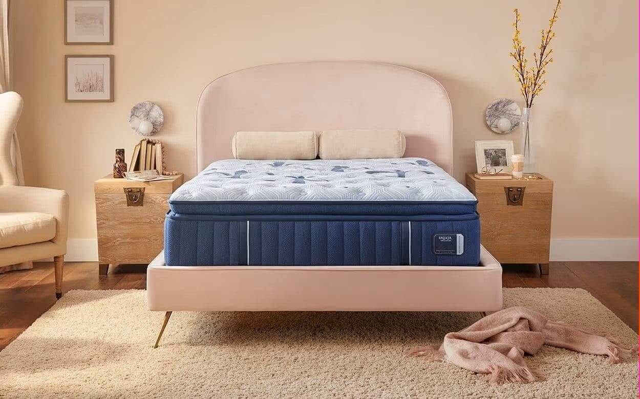 Stearns & Foster Estate® Soft Pillow Top 15" mattress on a stylish bed in a cozy, elegantly designed bedroom setting.