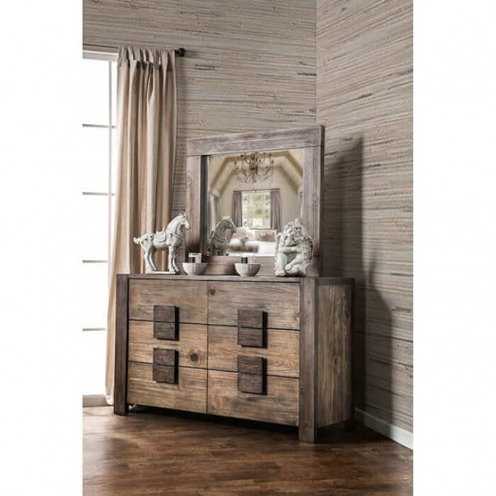 Janeiro Rustic Dresser with wooden block-like pulls and a mirror, enhancing urban charm in an airy loft setting.