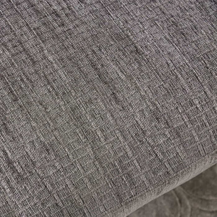 Close-up of soft gray chenille fabric used in the Kaylee Gray Sectional Sofa, showcasing its textured finish.