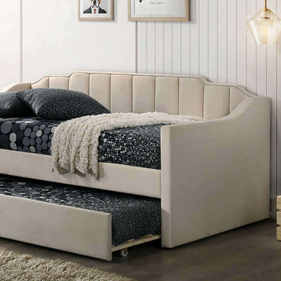 Kosmo Beige Daybed with staircase headboard and pull-out trundle, styled with textured bedding in contemporary interior.