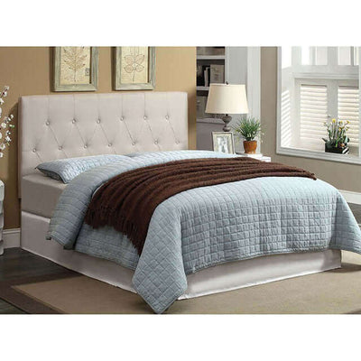 Elegant ivory tufted headboard with cozy bedding in a stylish bedroom setting. Ideal for queen or full beds.
