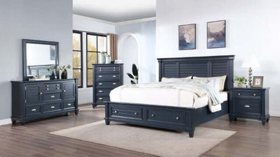 Manzanillo Slate Blue storage bed set with tall headboard, nightstand, dresser, and mirror in a modern bedroom setting.