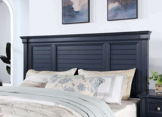 Manzanillo Slate Blue storage bed headboard featuring elegant panel design and decorative molding details.