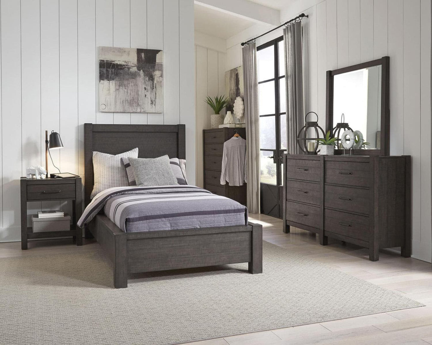 Cozy bedroom featuring Mill Creek Collection Carob Dresser, stylish bed frame, and modern decor in a bright, airy space.