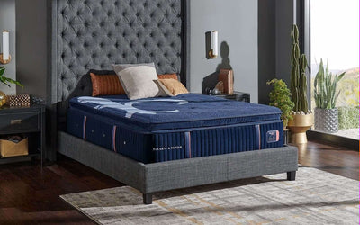 Stearns & Foster Reserve® 17" Firm Pillow Top Mattress on stylish bed in elegant bedroom setting with modern decor.