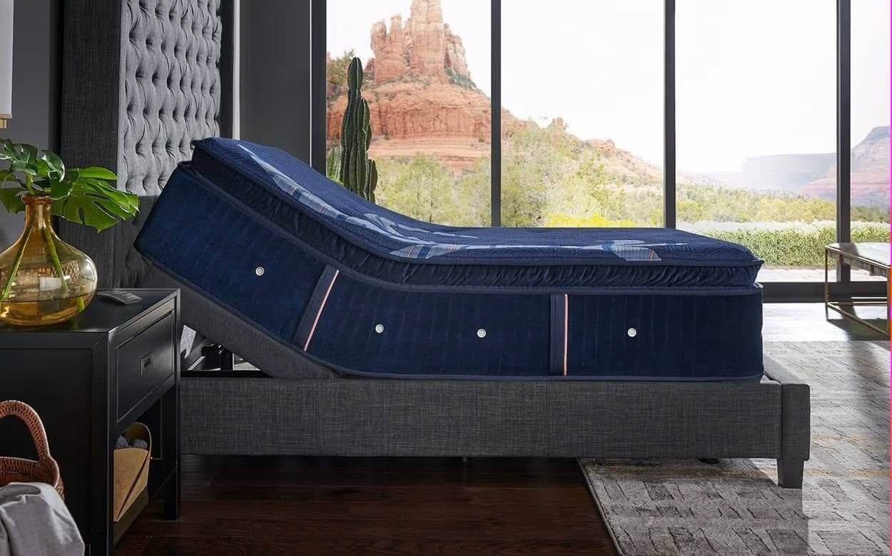 Stearns & Foster Reserve® 17" Soft Pillow Top Mattress in a modern bedroom with scenic views.