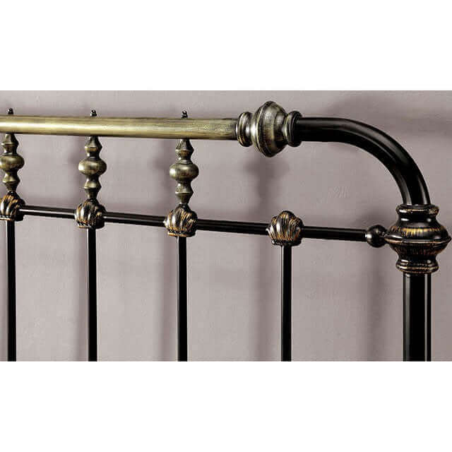 Dark bronze metal bed frame headboard with antique accents and elegant ornamental design.
