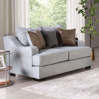 Skyline Gray Transitional Loveseat with plush back pillows and dark throw pillows in a modern living room setting.