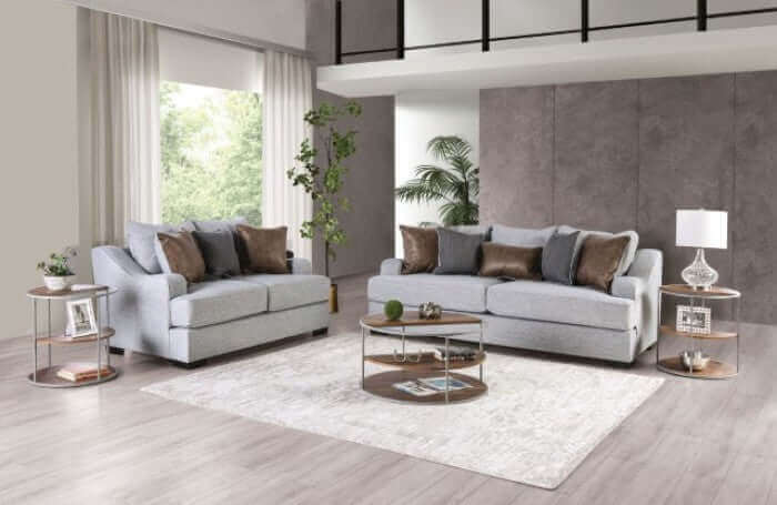 Skyline Gray Transitional Sofa set in a modern living room, featuring soft fabric, plush pillows, and stylish decor elements.
