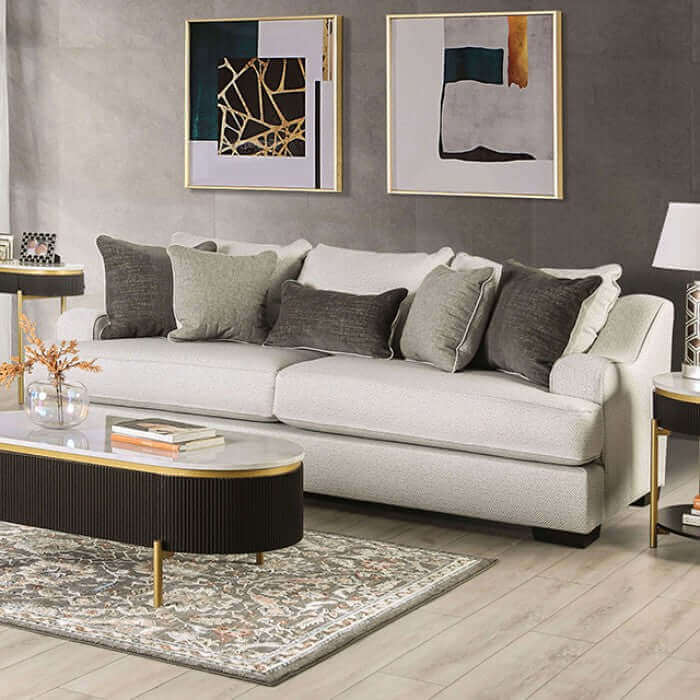 Skyline Pewter Gray transitional sofa with dark throw pillows in a stylish living room setting.