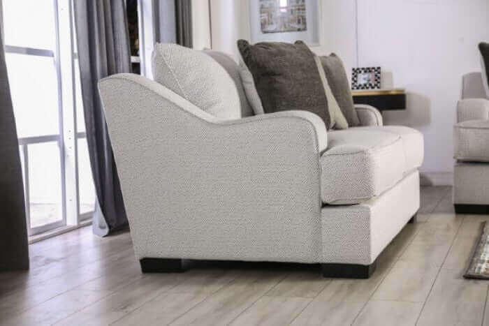 Skyline Pewter Gray Transitional Sofa with bold arms and loose back pillows in a stylish living room setting.