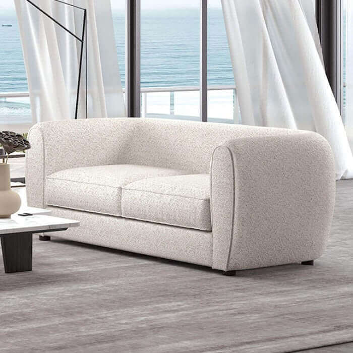 Verdal Off White Contemporary Loveseat featuring soft boucle fabric and a unique bulbous design in a modern living room setting.